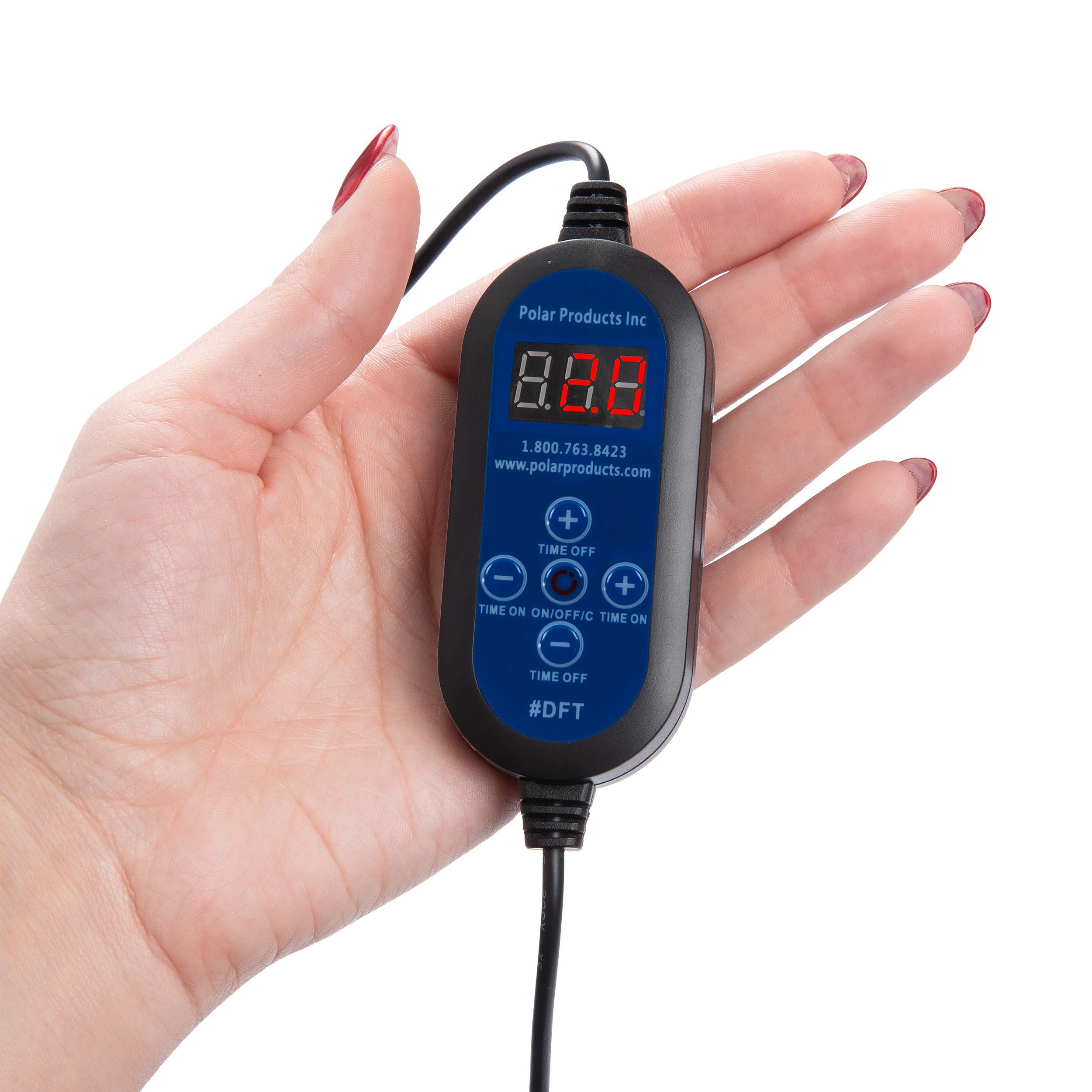 Blue digital programmable timer device for an Active Ice® or Cool Flow® system held in a hand with a white background