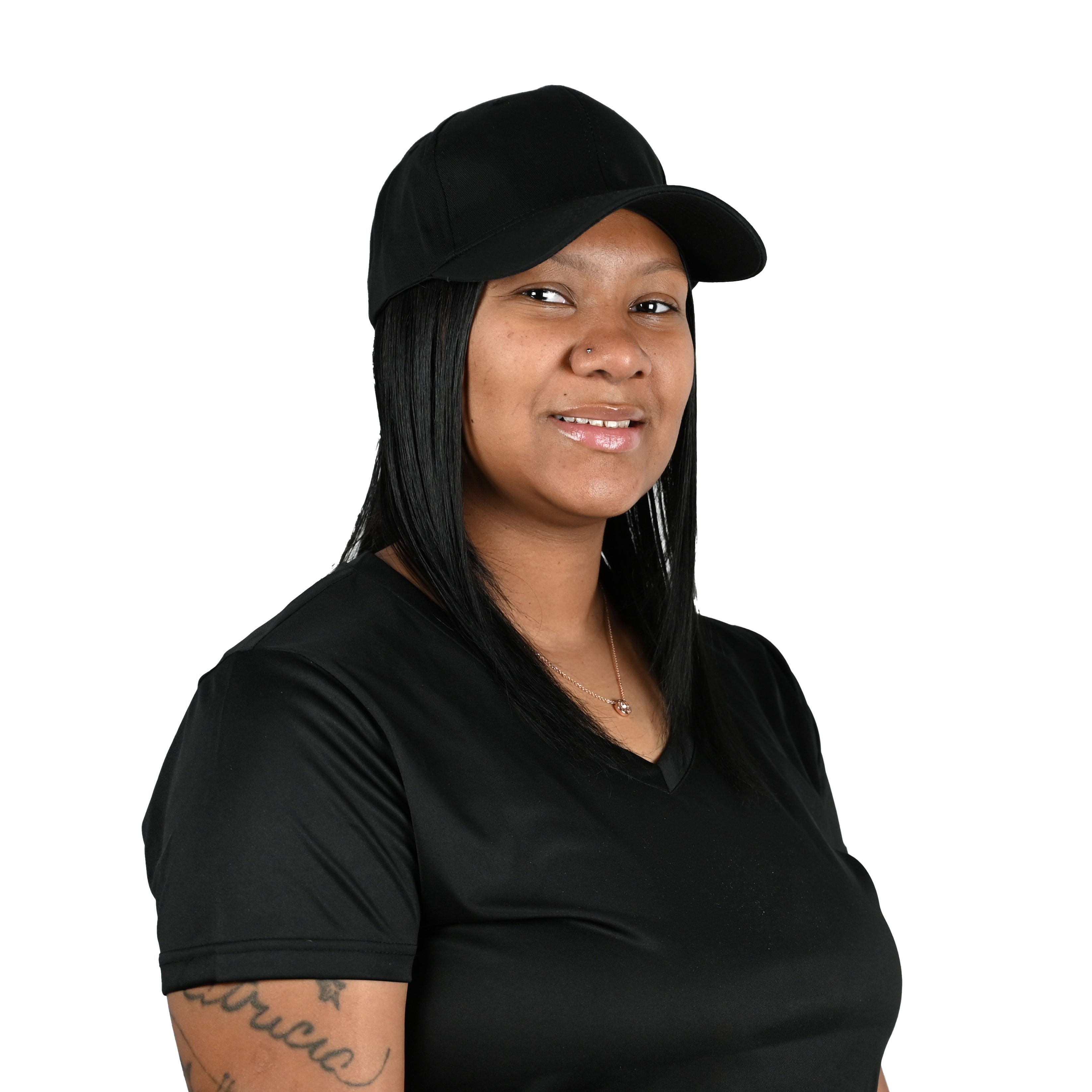 Person wearing a black cooling cap and black shirt on a white background