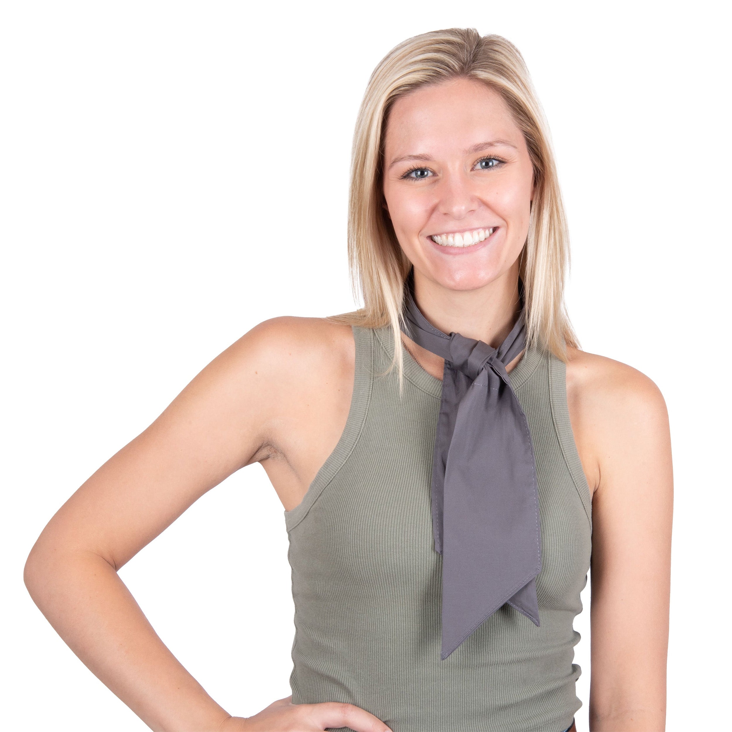 A smiling blonde woman wearing a sleeveless olive green tank top and a dark gray deluxe cooling neck wrap, posed against a solid white background.