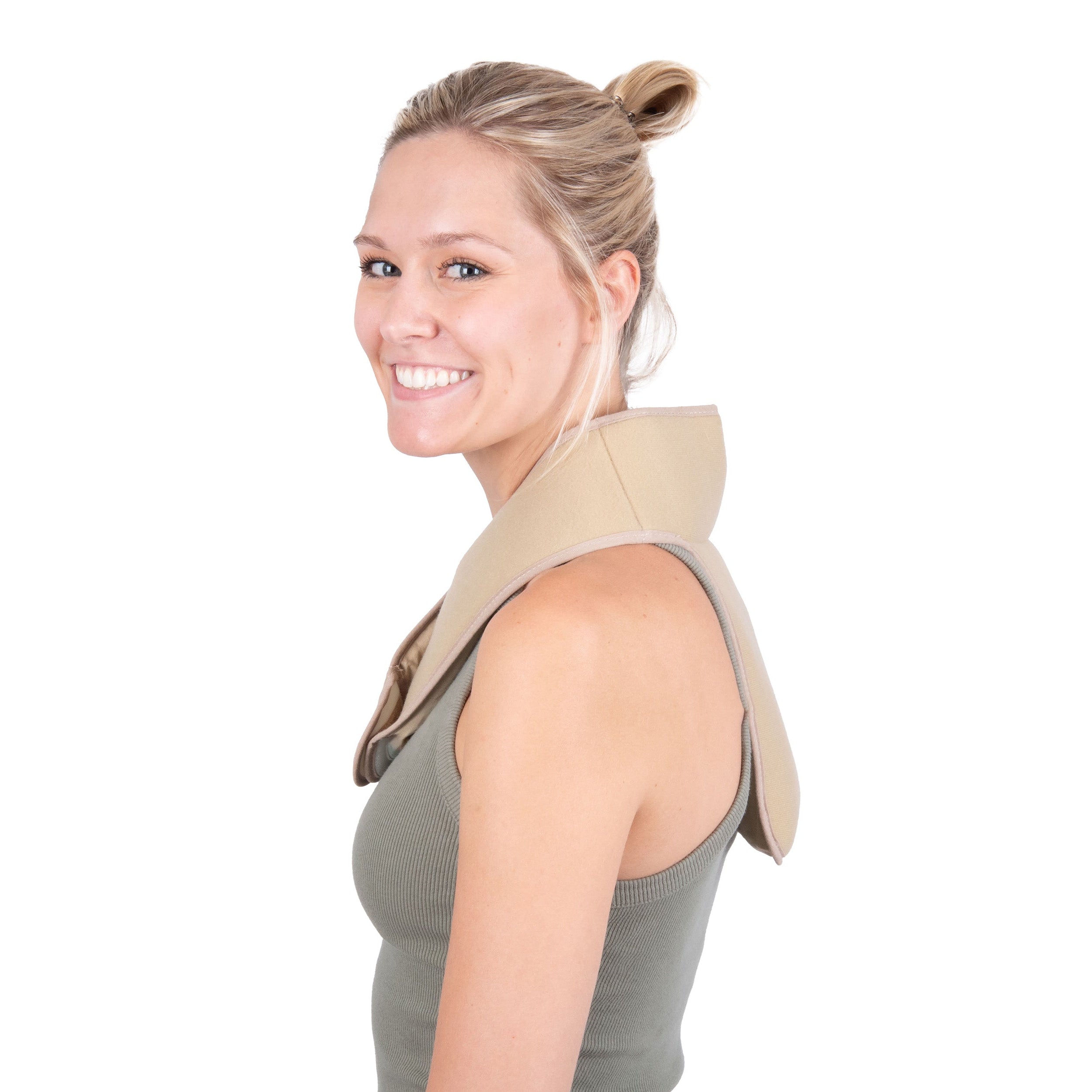 A woman with blonde hair in a bun wearing a beige cooling neck and upper spine wrap over a gray tank top, shown from a side profile against a solid white background.