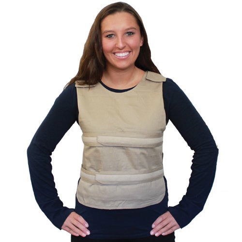 Woman wearing a beige poncho-style adjustable cooling vest over a dark long-sleeve shirt on a white background