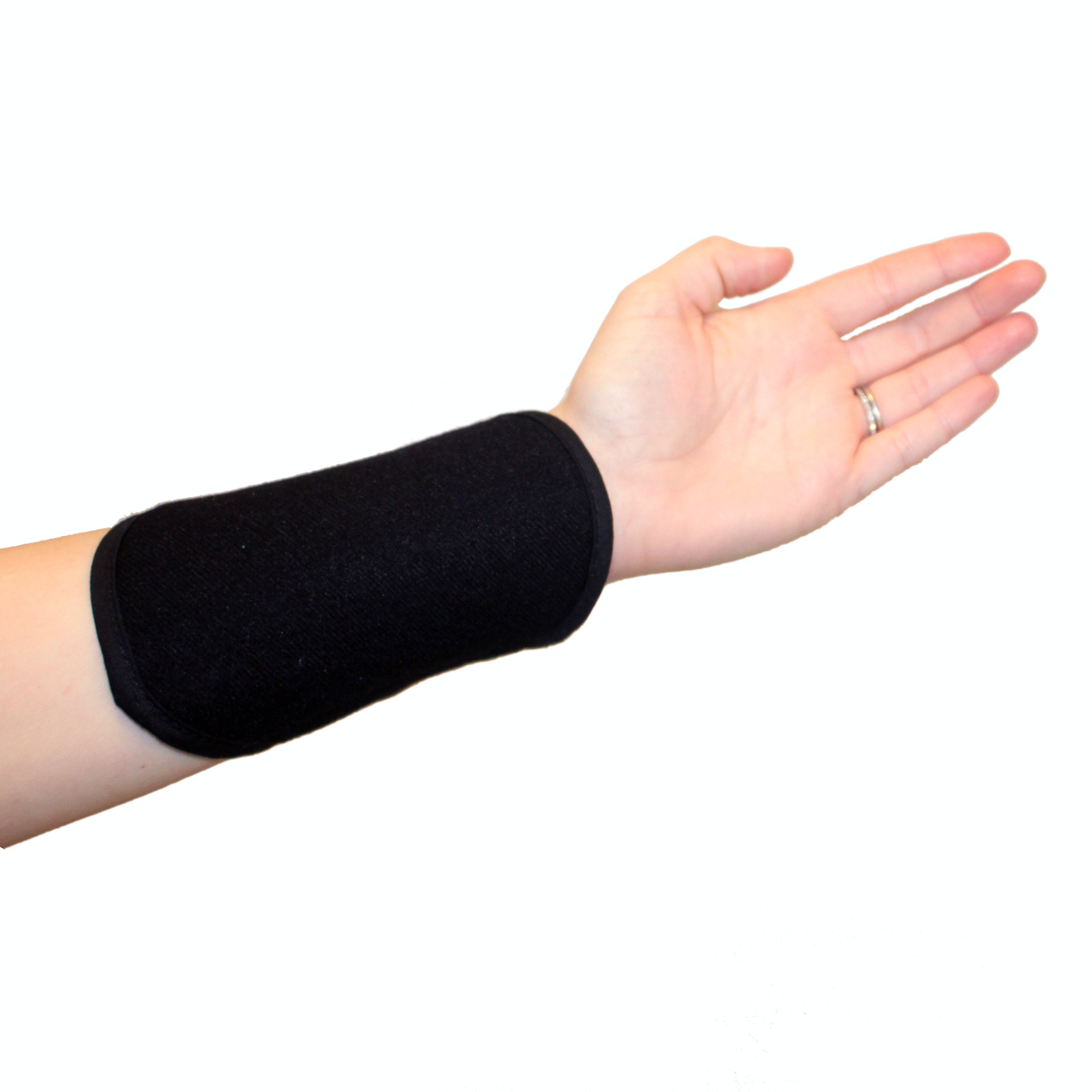 Black cooling wrist wrap on a wrist on a white background