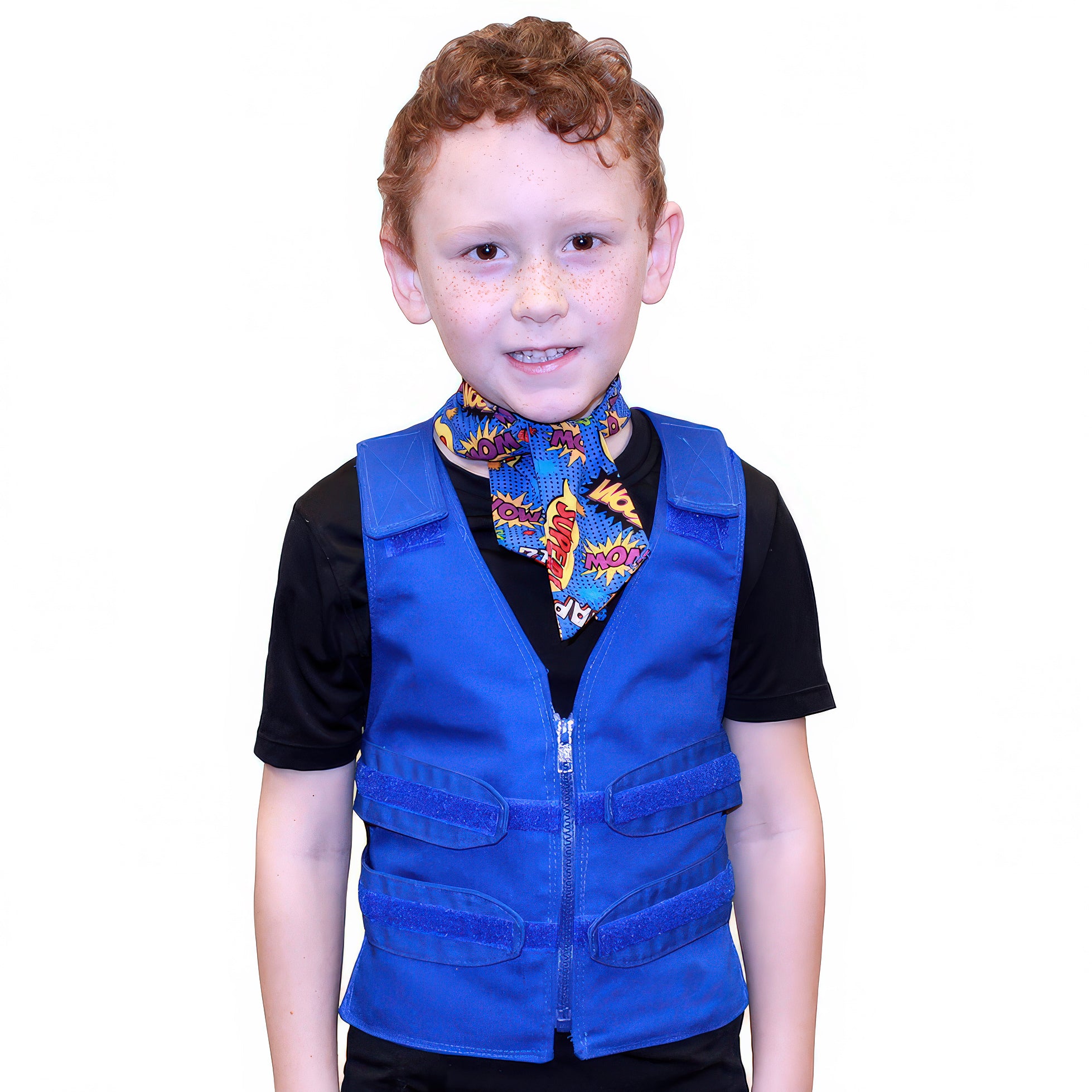 A smiling child wearing a blue adjustable cooling vest over a black t-shirt with matching comic book style cooling neck wrap, photographed on a white background.