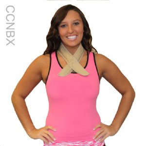 Woman wearing a pink tank top with a beige cooling neck and upper spine wrap standing against a white background.