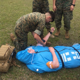 Military training exercise with with the Polar Life Pod® on a grassy field.