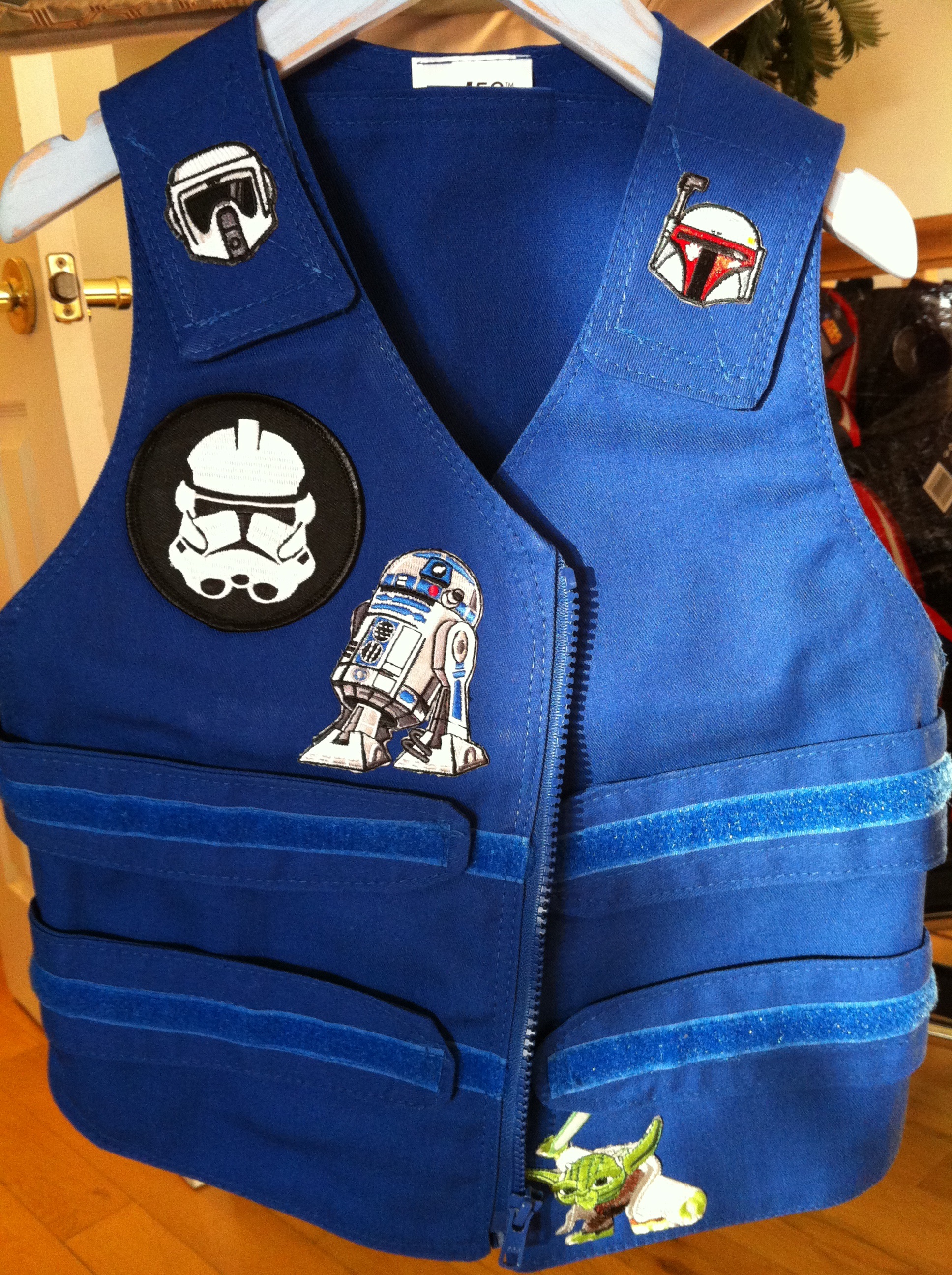 Blue Cool Kids toddlers cooling vest with star wars patches sewn on